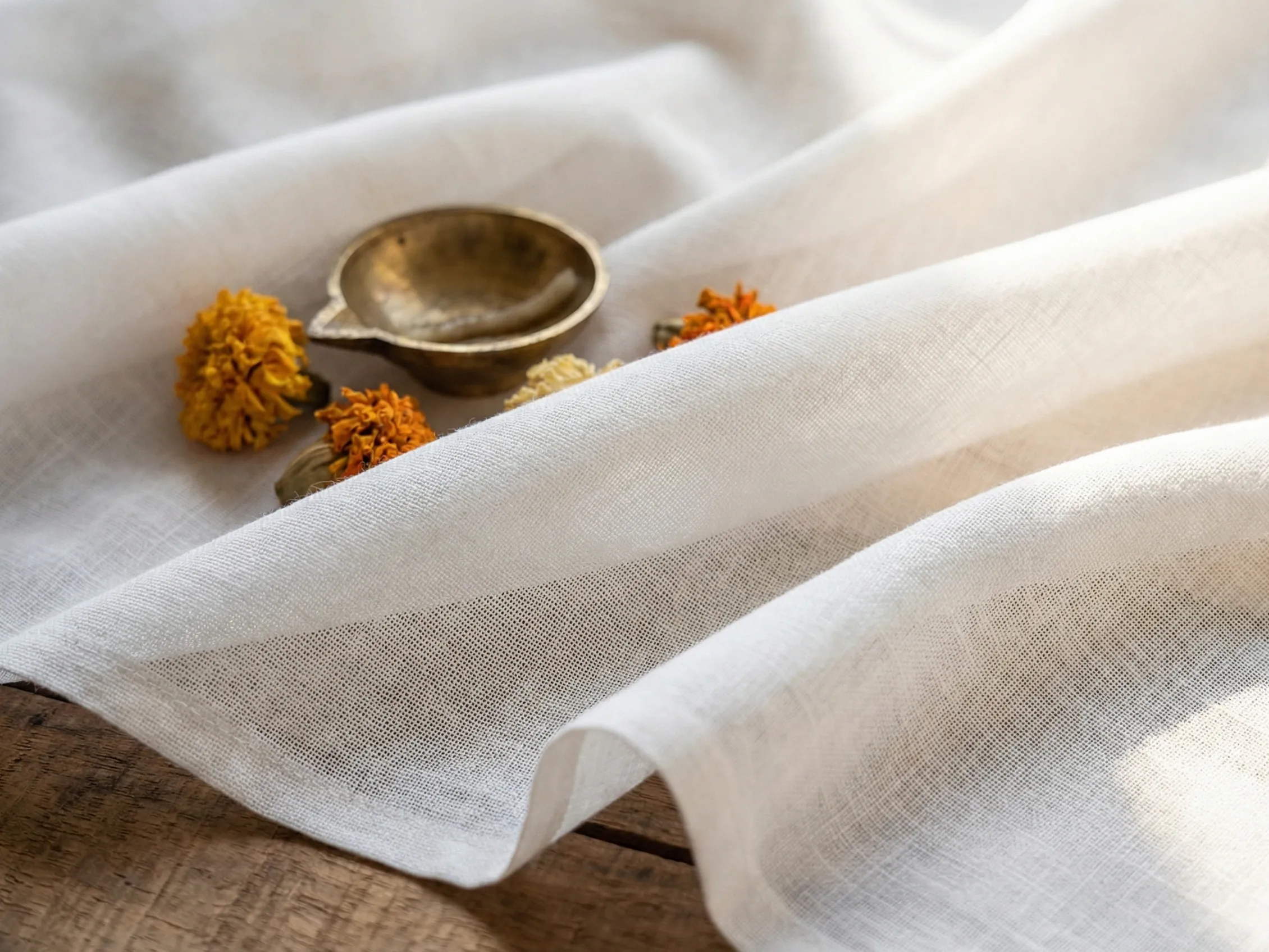 Close-up of cotton fabric used in premium Laddu Gopal poshak at Gopalji Fashion