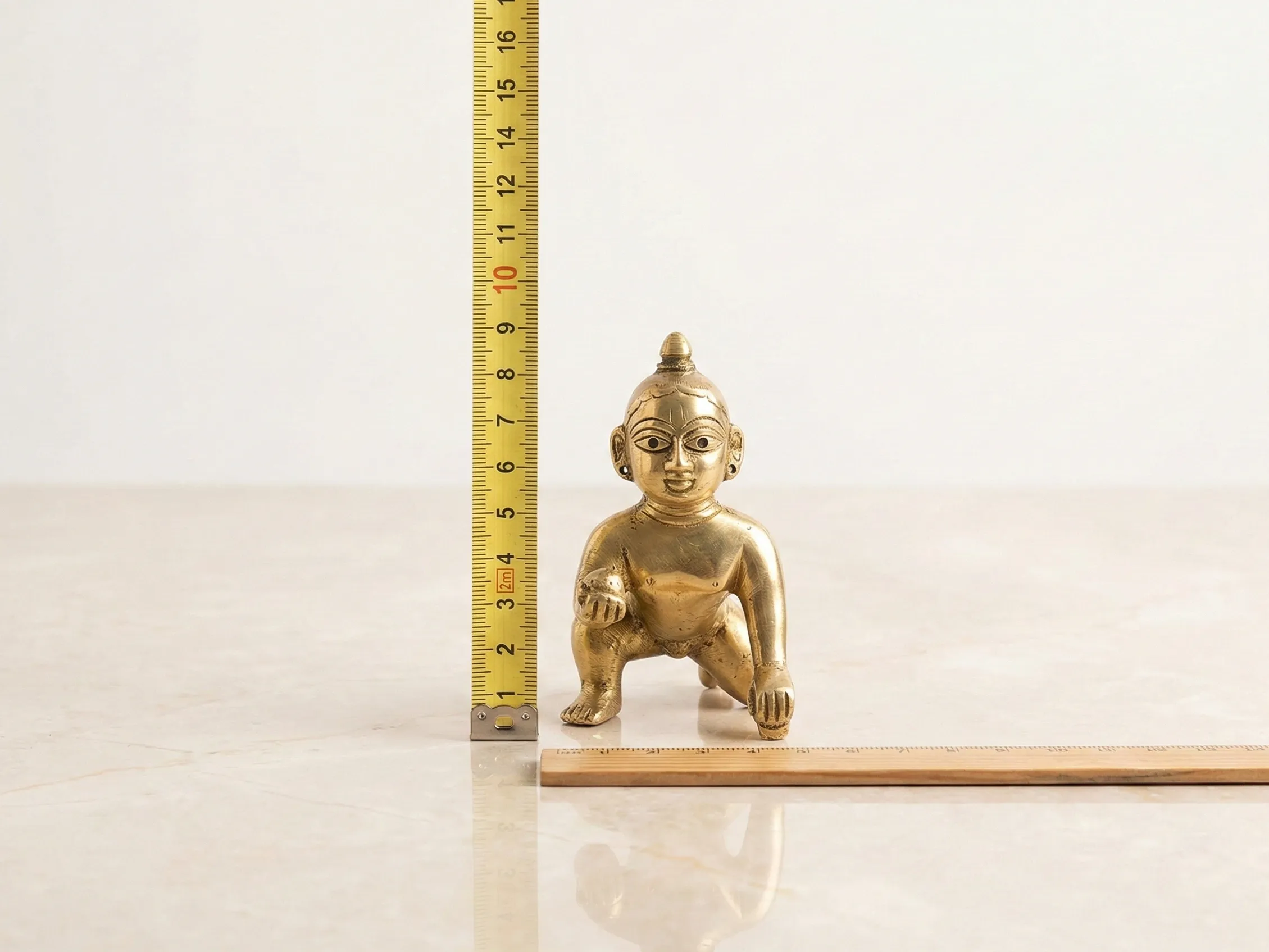 Laddu Gopal size measurement diagram showing how to measure height from base to head, excluding the crown